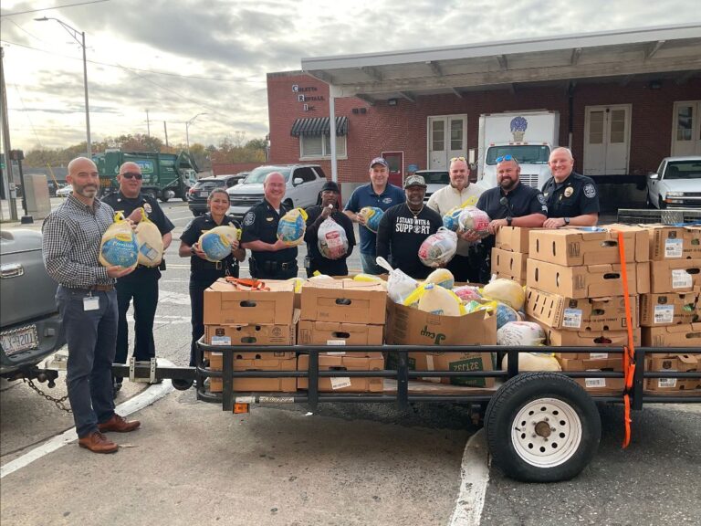 Gastonia PD and 101 Black Men give away turkeys and hams